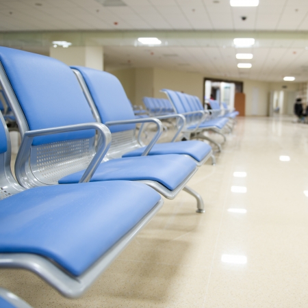 Hospital waiting room with empty chairs. の写真素材