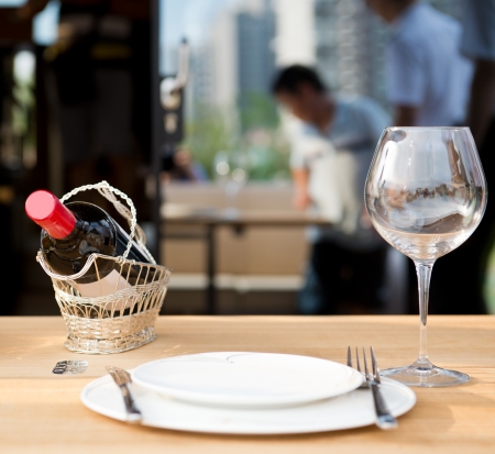 Wine bottle on table with glass.の写真素材