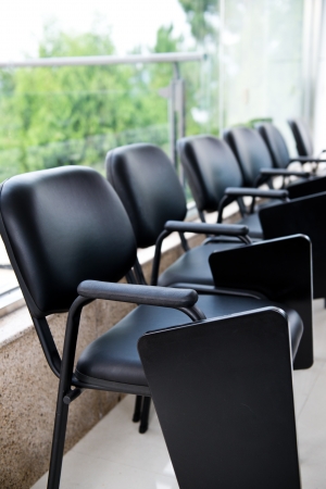 Row of chairs in boardroom.の写真素材