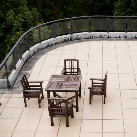 Apartment building roof top terrace exterior with table and chairs.の写真素材