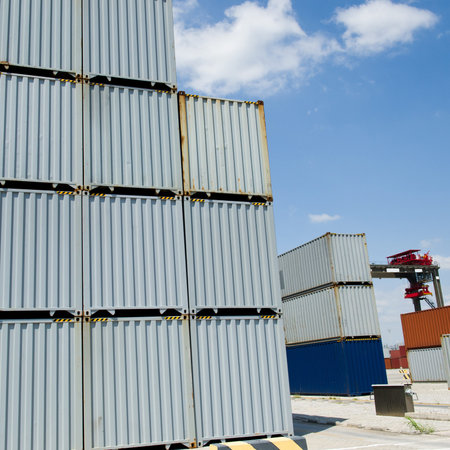 Lot's of cargo containers at the docks.