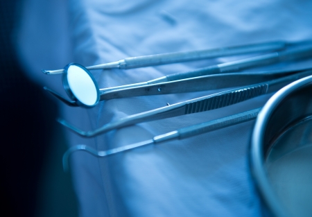 Metallic dentist tools close up in a dentist clinic.の写真素材