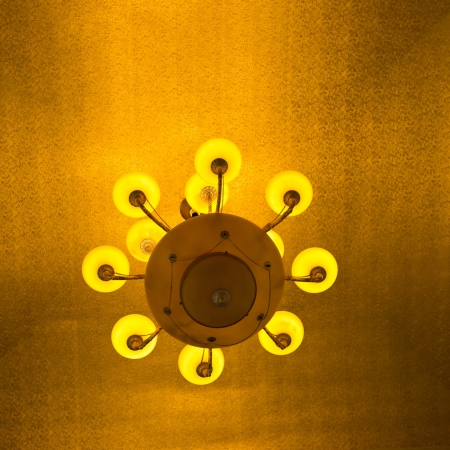 Close-up of a beautiful lamp hanging on ceiling.の写真素材