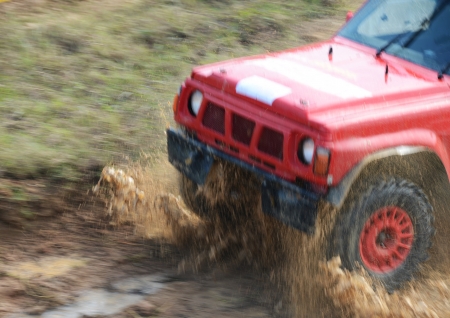 Driver competing in an off-road 4x4 competition.の写真素材