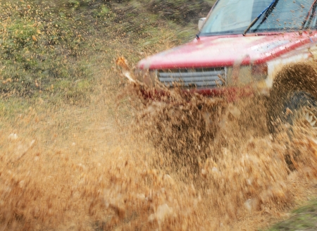 Driver competing in an off-road 4x4 competition.の写真素材