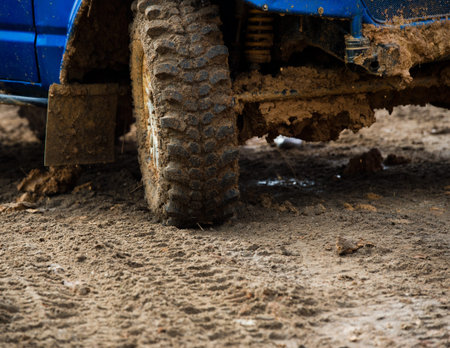 close-up shot of wheel in dirt. の写真素材