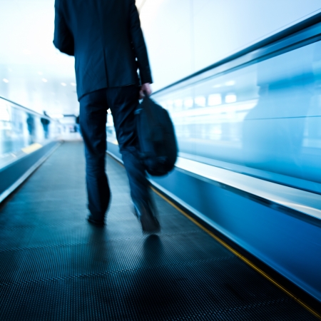 movement of abstract escalator with people.の写真素材