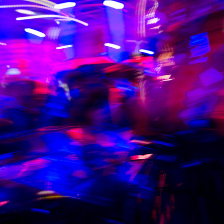Dancing people in a disco, cheery party.の写真素材