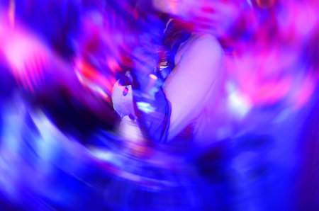 Cheerful women dancing at the night club.