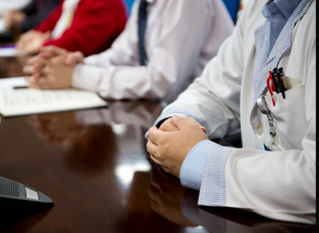 Closeup of doctors at medical conference.