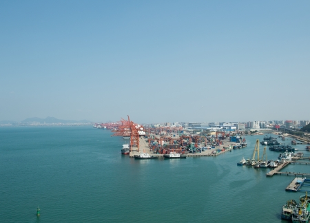 Lot's of cargo freight containers in the port.の写真素材