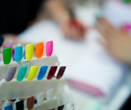 Woman in a beauty salon making nails.の写真素材