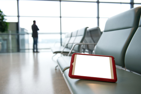 Airport seating with a digital tablet.  の写真素材