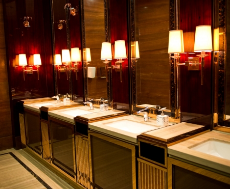 sinks and taps in a luxury public toilet.のeditorial素材