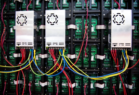 Server front side showing colorful switches and wiring.の写真素材