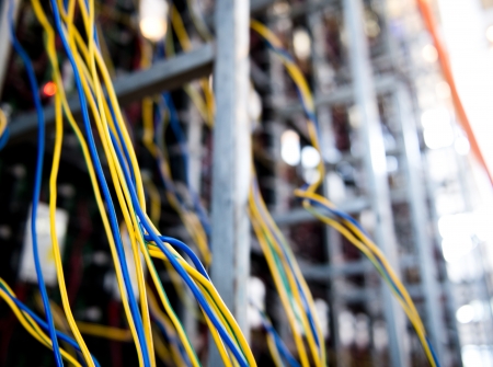 Server front side showing colorful switches and wiring.の写真素材