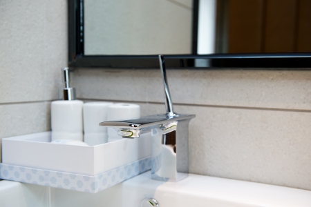 Modern style chrome bathroom tap in modern bathroom.
の写真素材