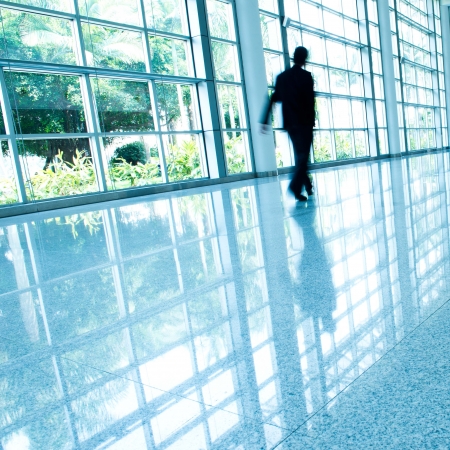 Business people rushing in the lobby. motion blurの写真素材