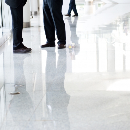 Low section of two businesspeople standing together.の写真素材