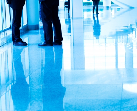 Low section of two businesspeople standing together.の写真素材