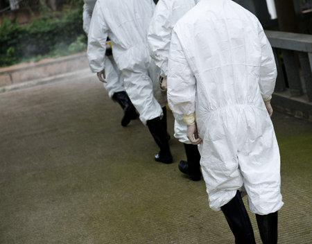 medical worker wearing a gas mask and a lab coat.