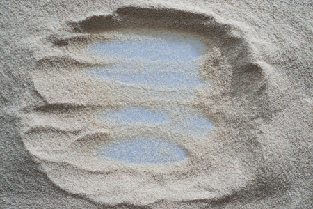 sand background with frame pattern.