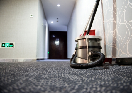vacuum cleaner stands in the hotel corridor.の写真素材