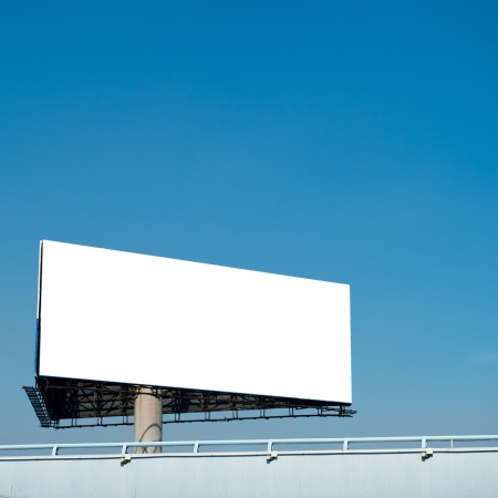 Blank billboard against blue sky.の写真素材