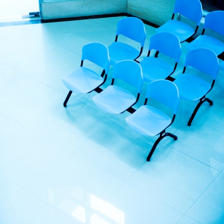 Hospital waiting room with empty chairs.の写真素材