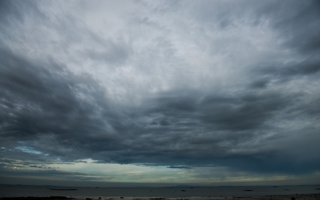 Background of dark clouds before a thunder-stormの写真素材