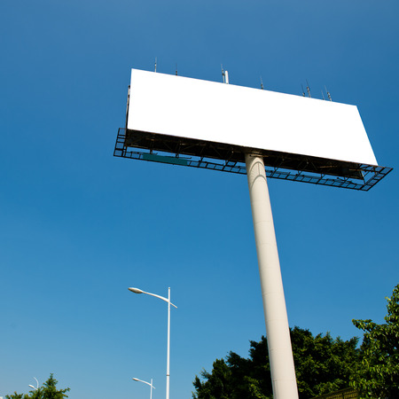 Blank billboard against blue sky.の写真素材