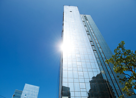 modern glass silhouettes on modern building.の写真素材