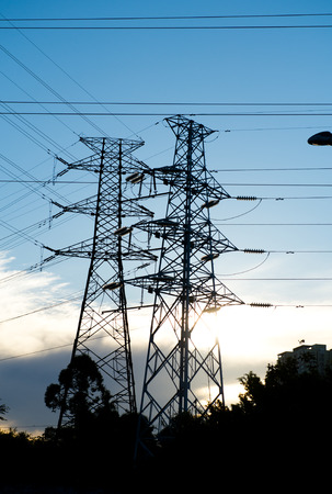 Electric power station against bright sky.の写真素材
