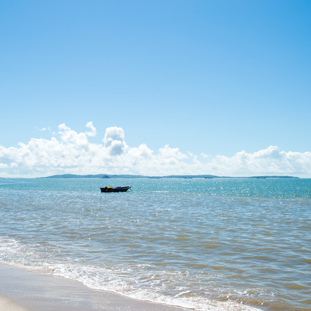 Blue sea with white clouds for background.の写真素材