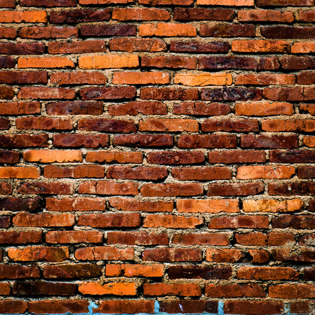 Background of old brick wall textureの写真素材