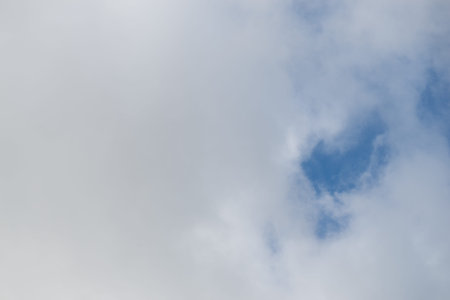 White clouds in the blue sky.