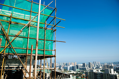 Scaffolding as safety equipment on a construction site.の写真素材