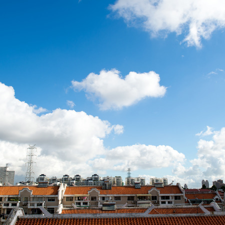 Large group of house roof and blue sky in a Chinese cityの写真素材