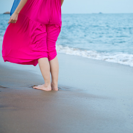 People standing on the beach.の写真素材