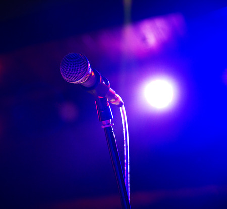Close up of microphone in concert hallの写真素材