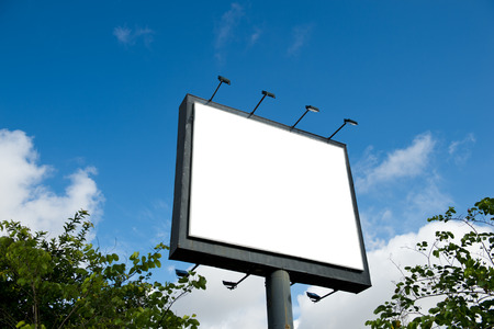 Blank billboard against blue sky.の写真素材
