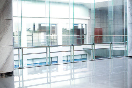 empty long corridor in the modern office building.のeditorial素材