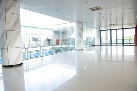 empty long corridor in the modern office building.のeditorial素材