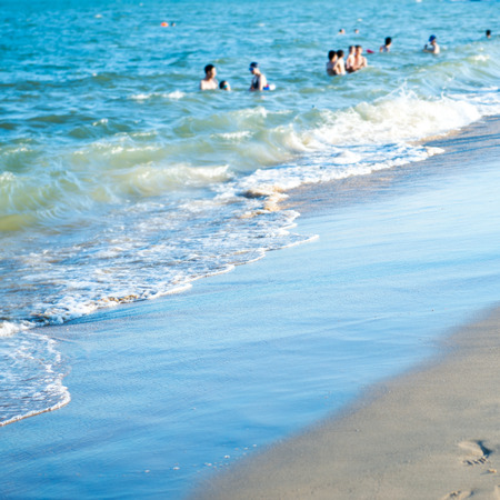 wave of the sea on the sandy beachの写真素材