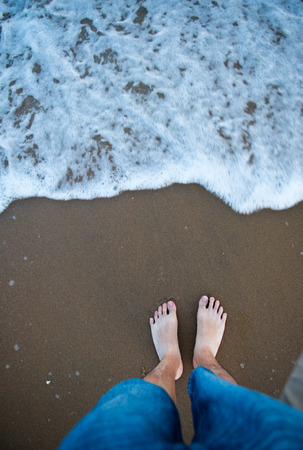 People standing on the beach.の写真素材