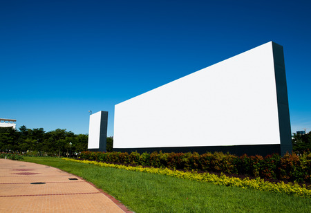 Blank billboard against blue sky.の写真素材