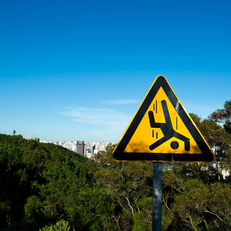 Warning sign on the top of mountains.の写真素材
