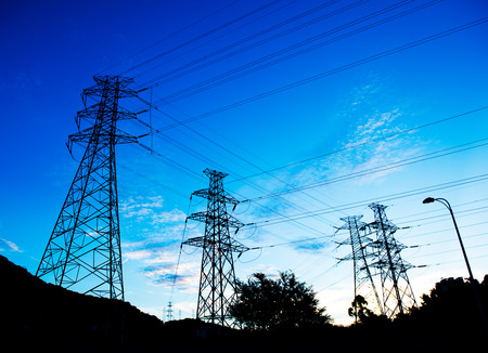 Electric power station against bright sky.の写真素材