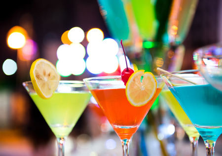 Group of colorful cocktail in martini glasses.の写真素材