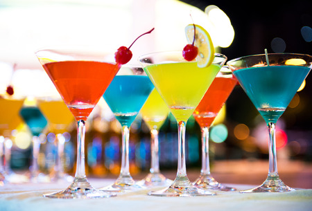 Group of colorful cocktail in martini glasses.の写真素材